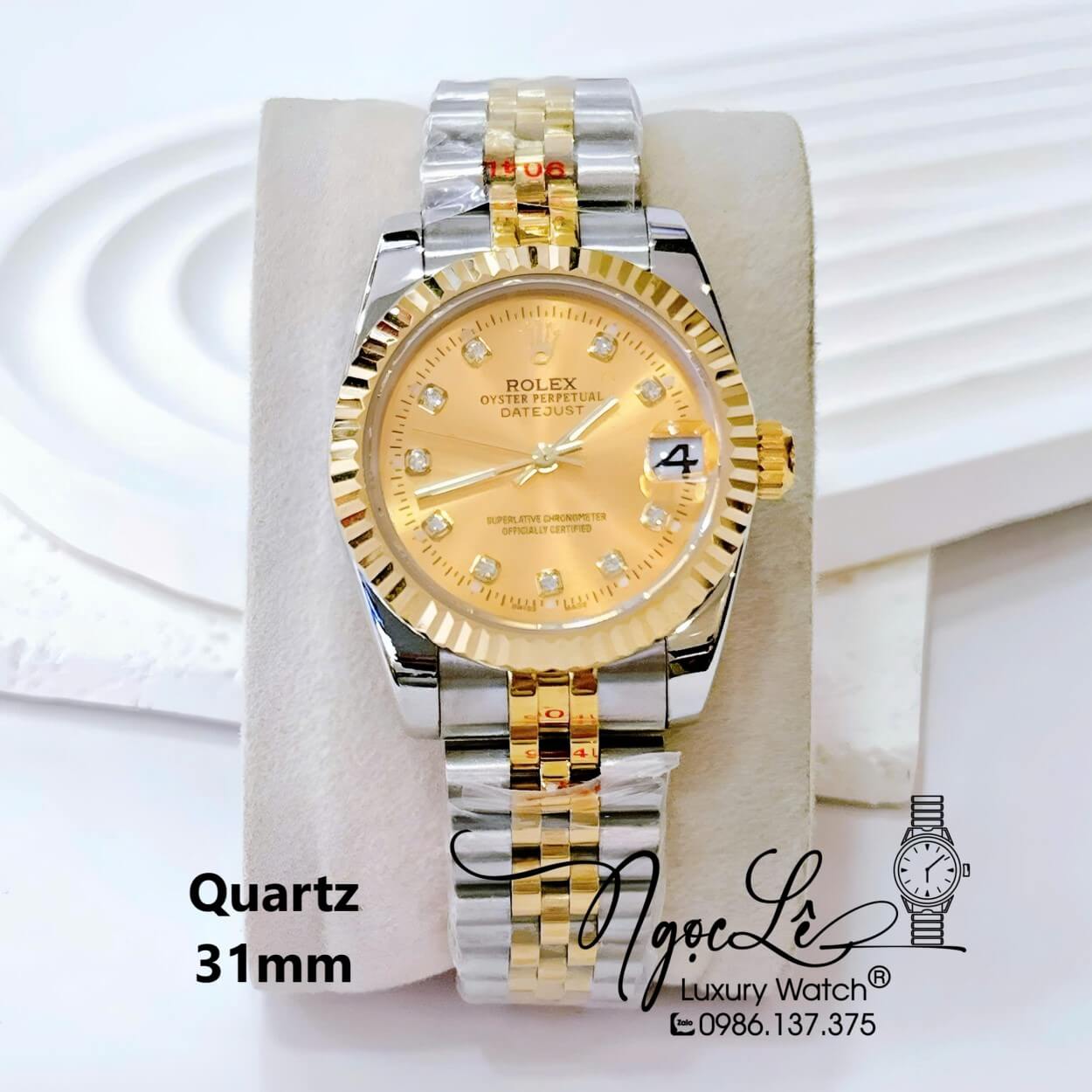 Đồng Hồ Nữ Rolex Datejust Pin Dây Kim Loại Demi Vàng Mặt Vàng Size 31mm