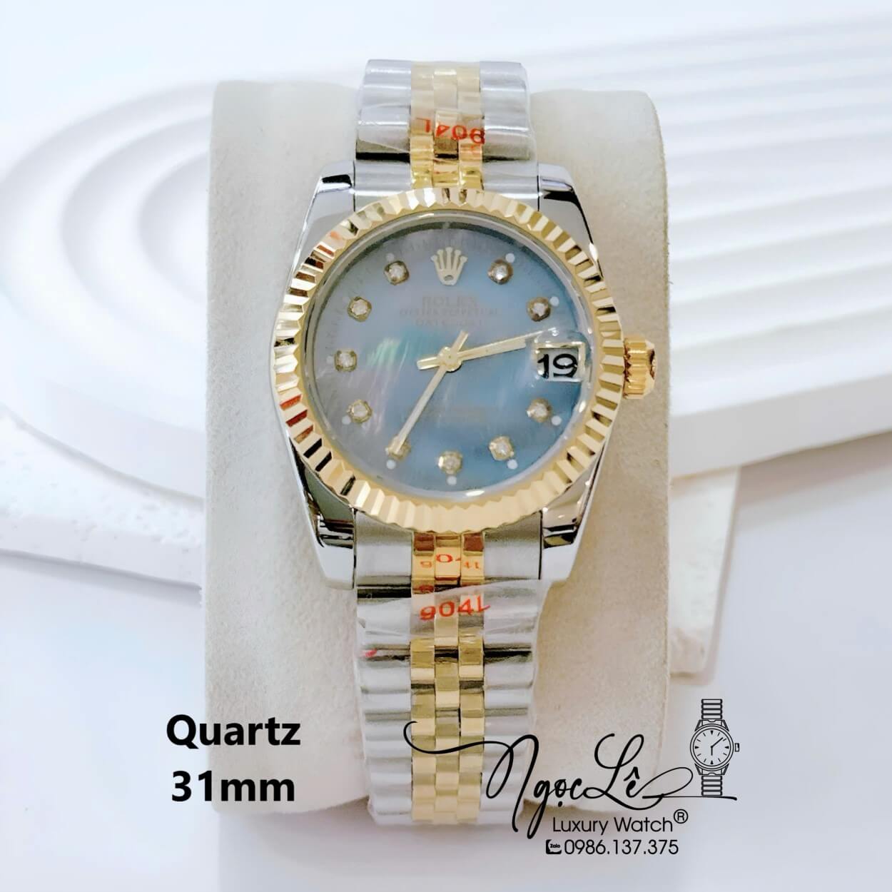 Đồng Hồ Nữ Rolex Datejust Pin Dây Kim Loại Demi Vàng Mặt Xanh Xà Cừ Size 31mm