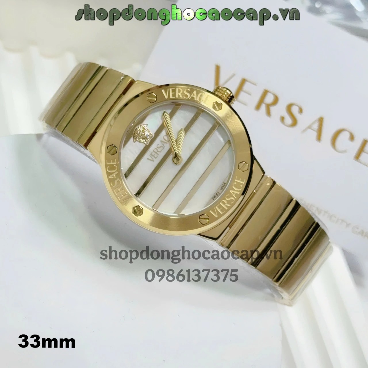 Đồng hồ Versace Greca Logo Pearl dây vàng mặt xà cừ trắng size 33mm - Đồng hồ Versace nữ Quartz Japan