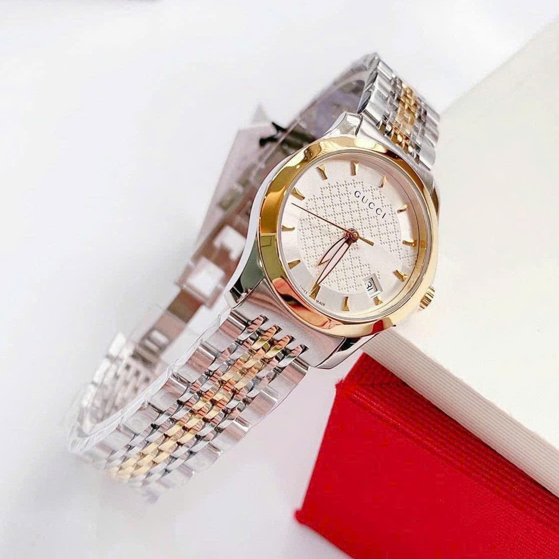 Đồng Hồ Nữ Gucci G-Timeless Dây Thép Demi Vàng Mặt Trắng Size 28mm