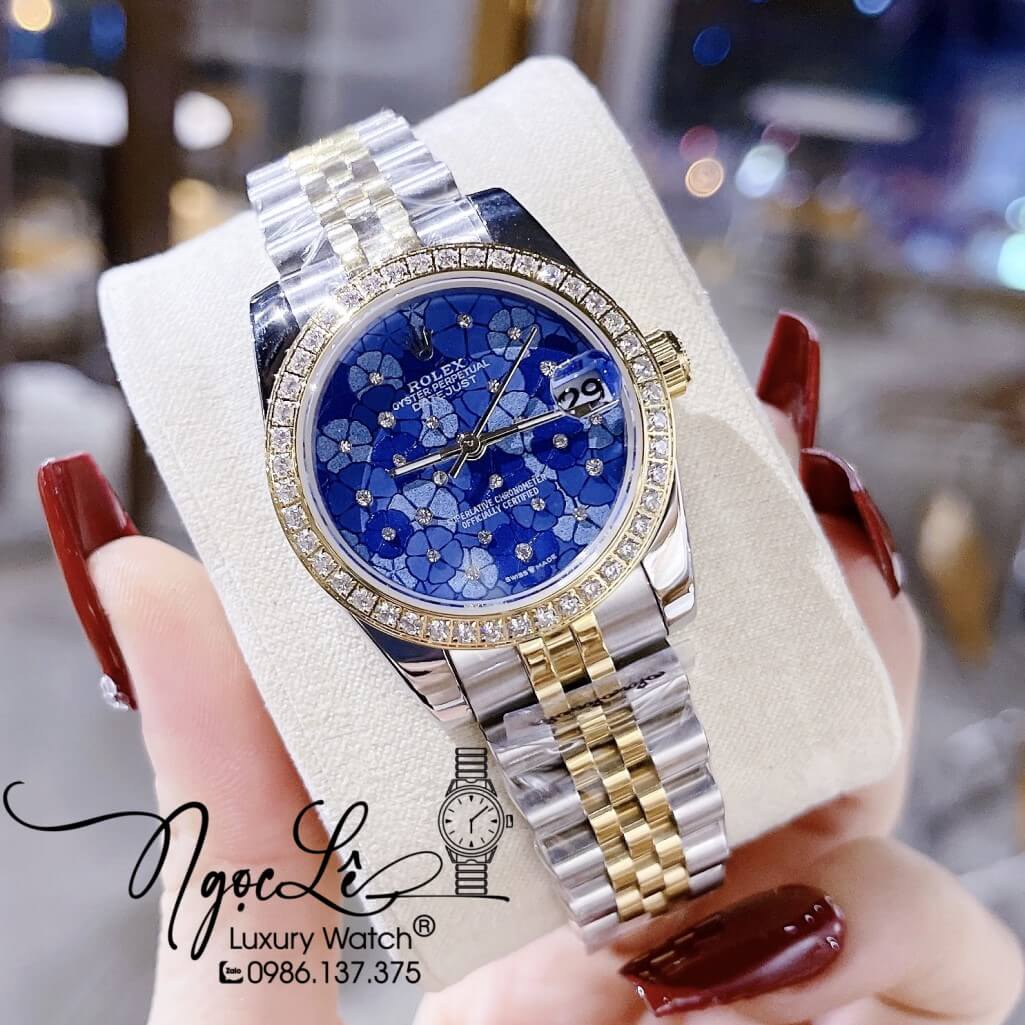Đồng Hồ Rolex Datejust Pin Nữ Mặt Số Họa Tiết Hoa Xanh Dương Size 31mm
