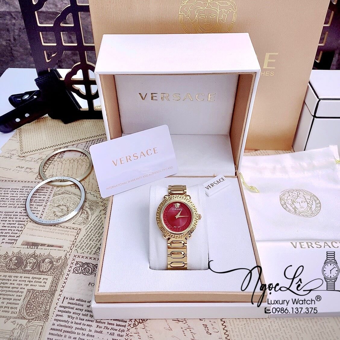 Đồng Hồ Nữ Versace Greca Twist Dây Kim Loại Vàng Mặt Đỏ Size 35mm