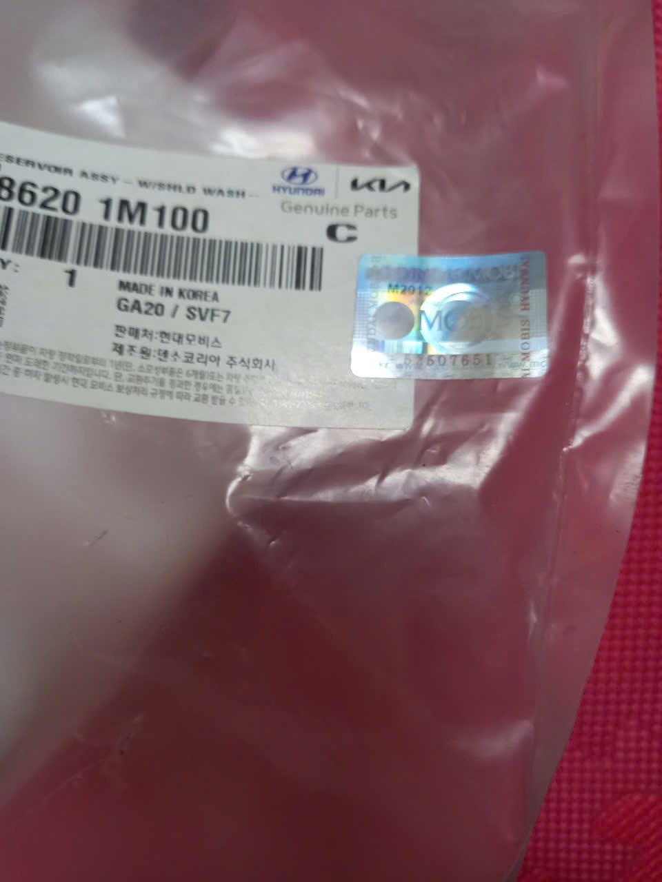 Bình nước rửa kính Kia Forte 2008-2014 | 986201M100