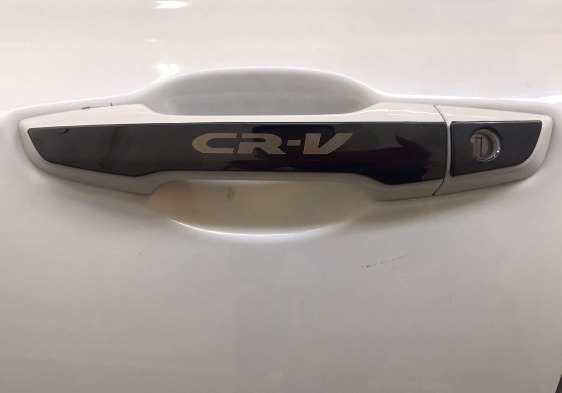 Ốp tay nắm cửa ô tô