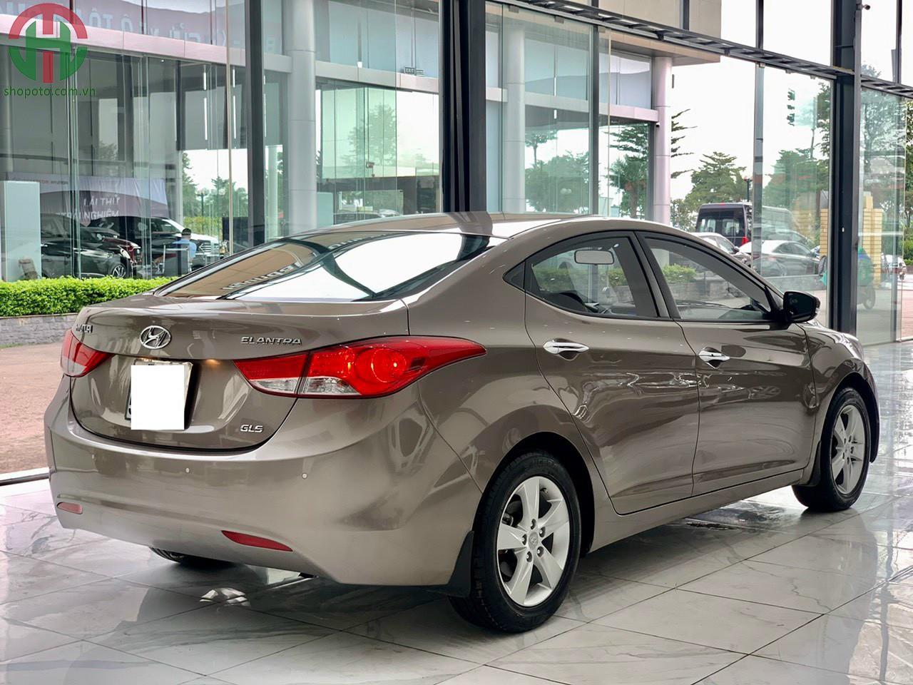 Hyundai Elantra 1.8 AT GLS 2013 màu Nâu nhập khẩu