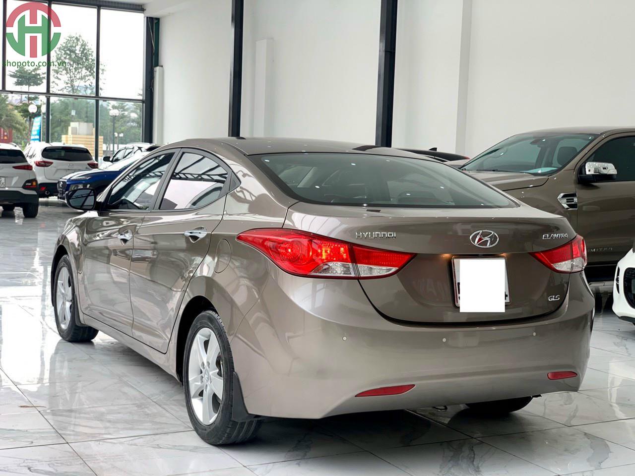 Hyundai Elantra 1.8 AT GLS 2013 màu Nâu nhập khẩu