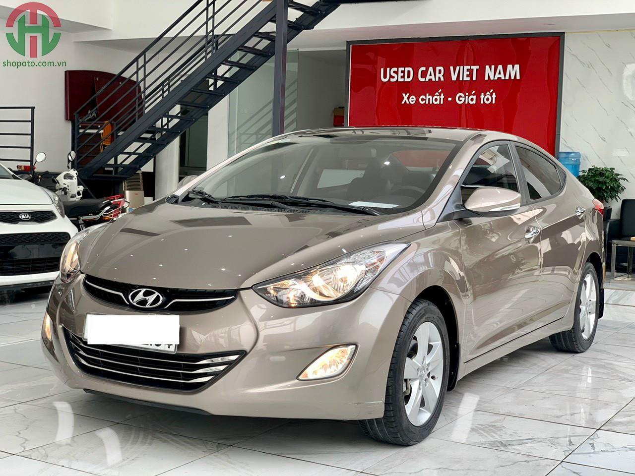 Hyundai Elantra 1.8 AT GLS 2013 màu Nâu nhập khẩu