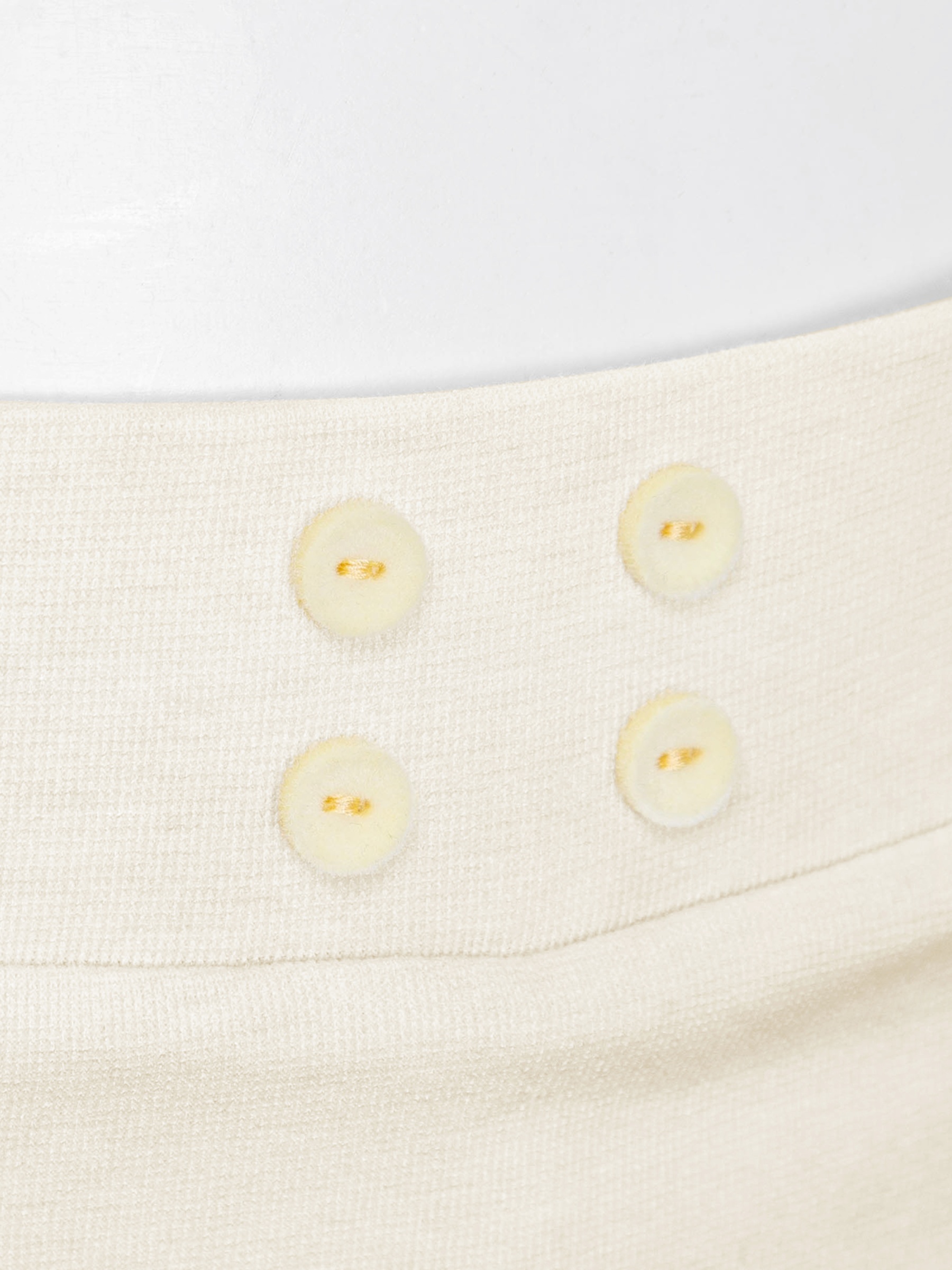 Set váy áo dài tay ôm dáng DKMV đính hàng nút màu vàng bơ