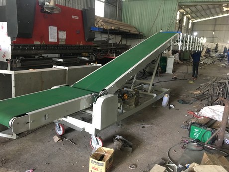 Những lợi ích nổi bật khi sử dụng băng tải lên xuống xe trong kho hàng