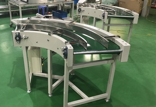 Các loại băng tải chuyền cong và ứng dụng thực tế