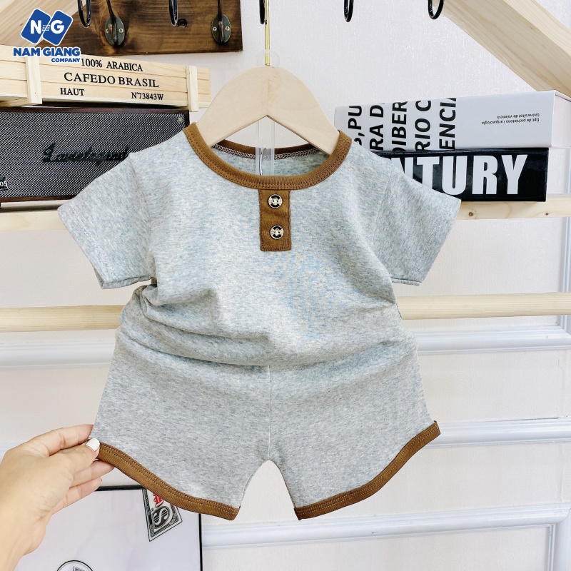 Bộ cộc tay sơ sinh thun 4 chiều màu trơn