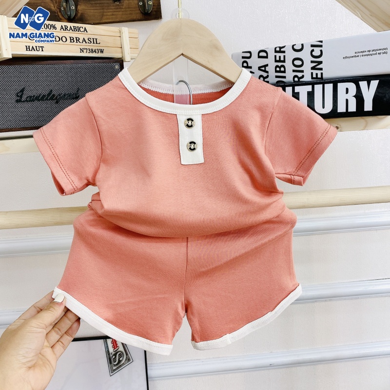 Bộ cộc tay sơ sinh thun 4 chiều màu trơn