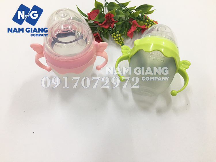 Quai cầm bình sữa comotomo