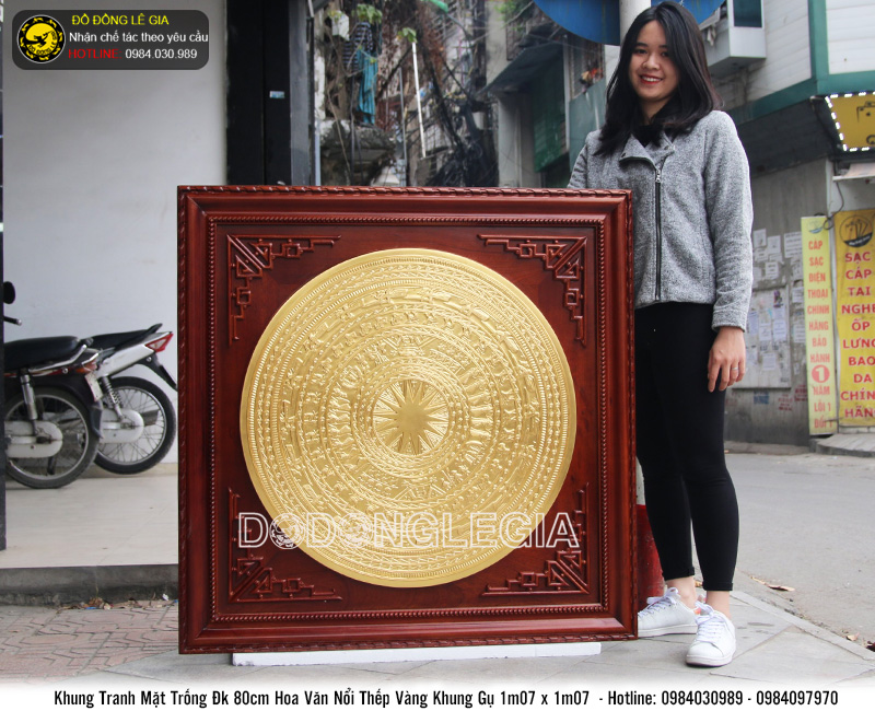 Tranh mặt trống hoa văn nổi khung gỗ Gụ thếp vàng 9999