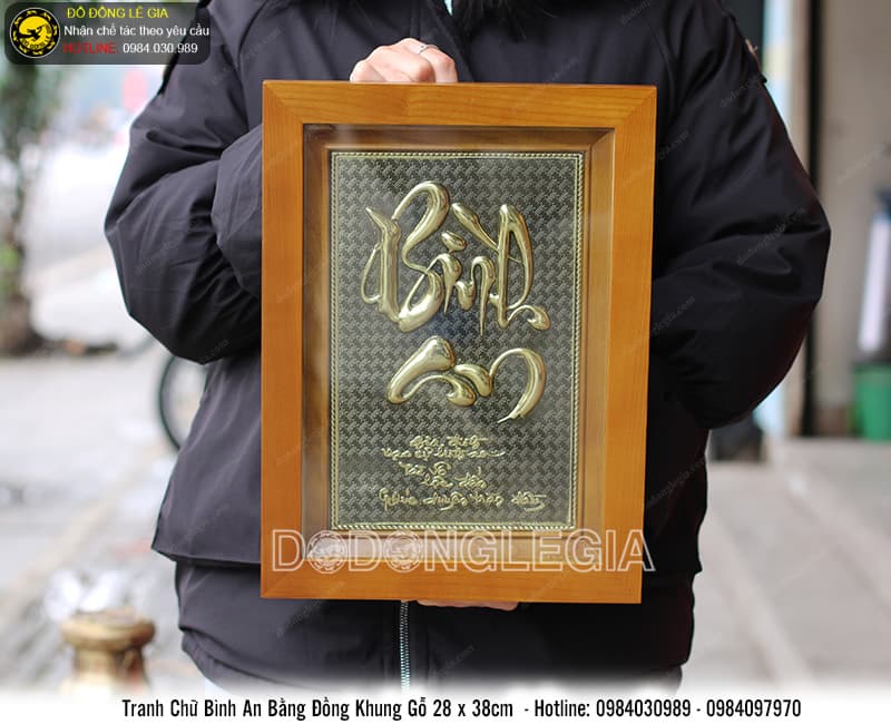 Tranh chữ bình an bằng đồng khung gỗ 28cm x 38cm