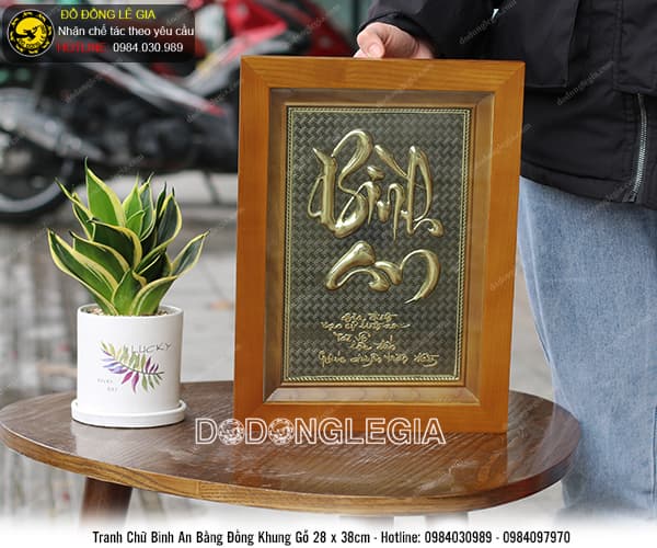 Tranh chữ bình an bằng đồng khung gỗ 28cm x 38cm