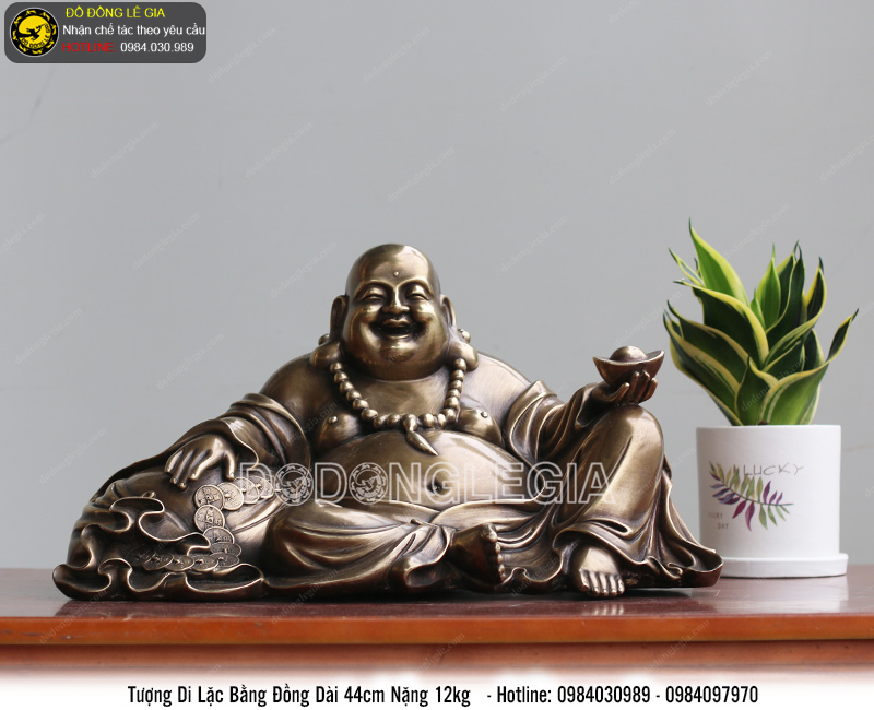 Tượng di lặc dựa bị bằng đồng dài 44cm