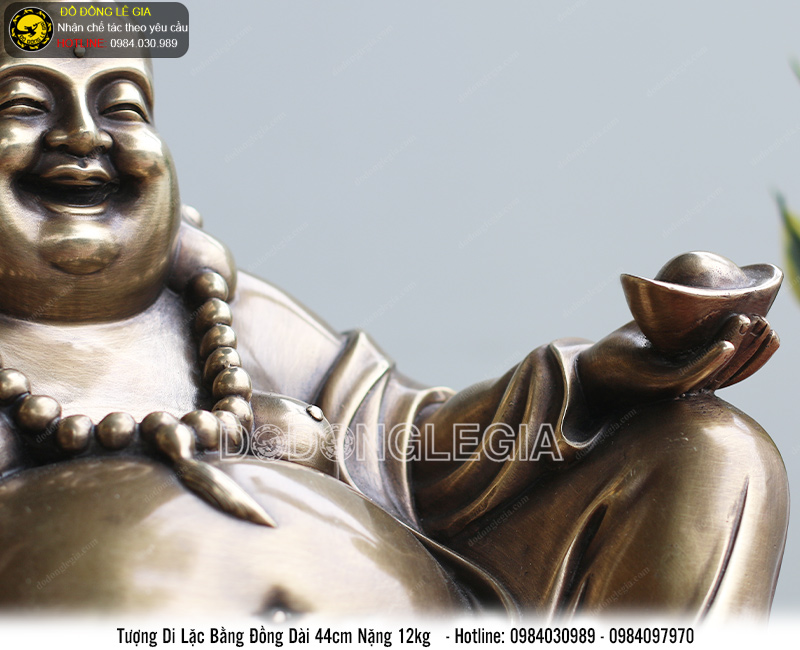 Tượng di lặc dựa bị bằng đồng dài 44cm