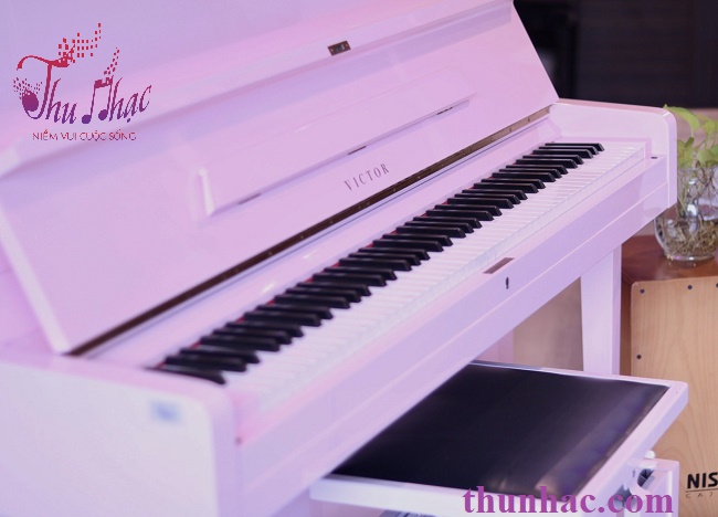 (mua piano cơ Victor  tại TP.HCM)