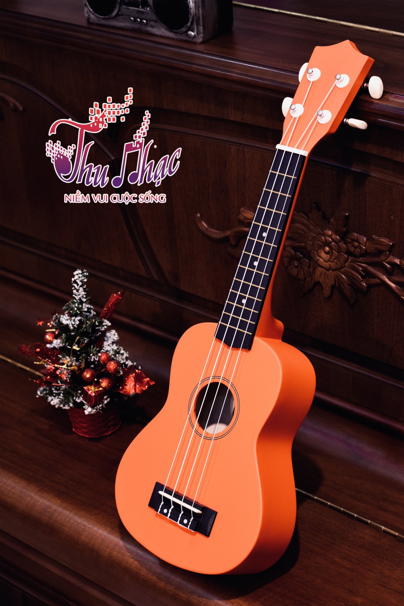 Ukulele màu cam giá rẻ
