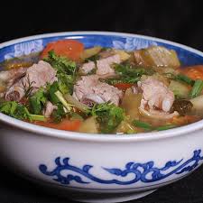 Cách Làm Món Canh Dưa Chua Nấu Sườn