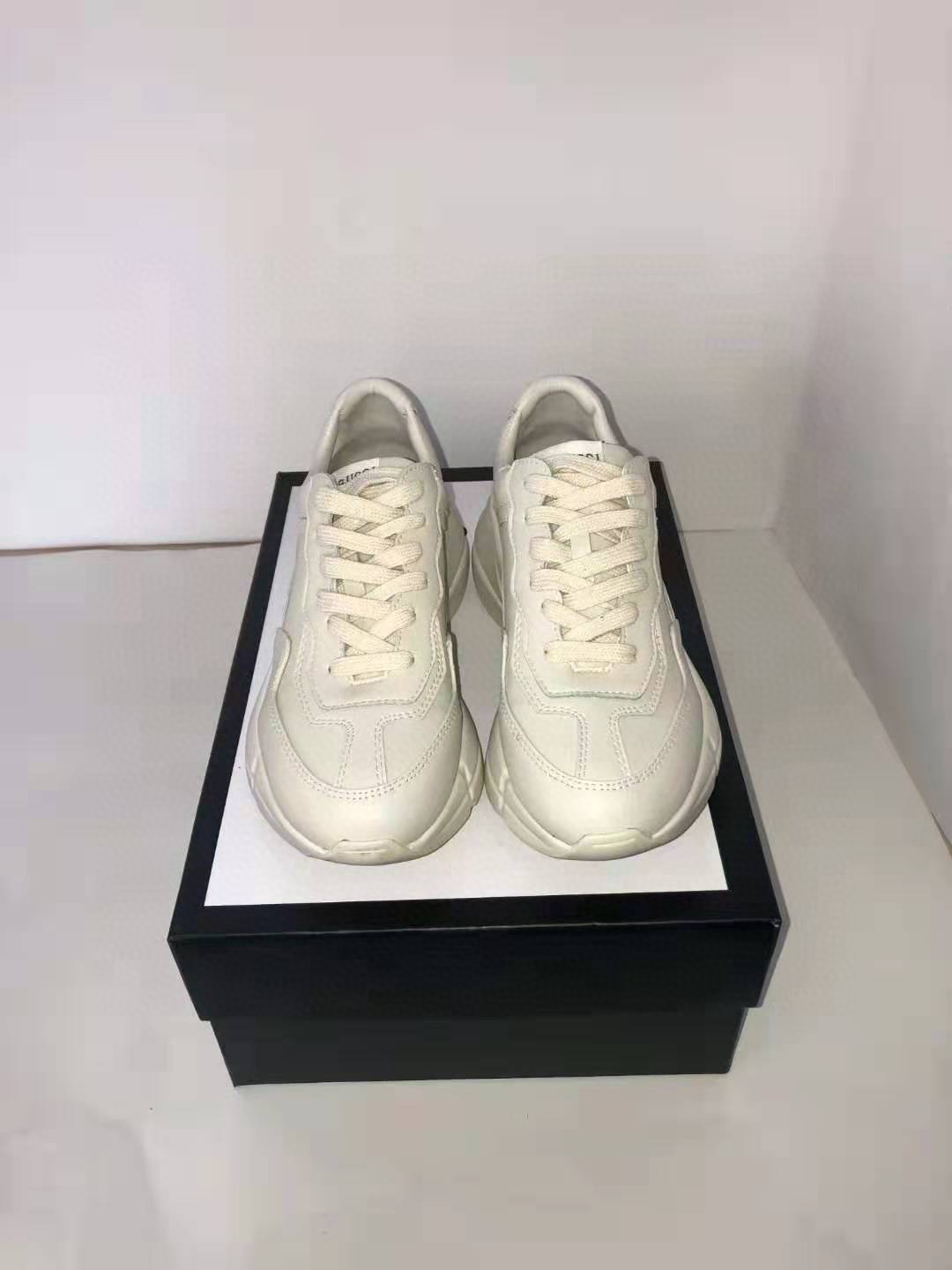 gucci men's rhyton leather sneaker with wave