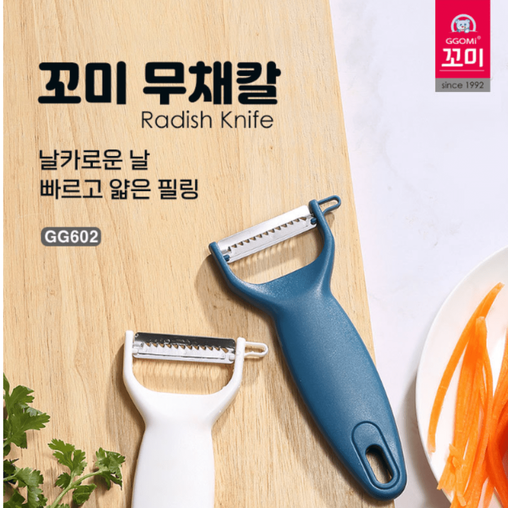 Nạo nhỏ lưỡi răng cưa GGOMi Hàn Quốc GG602. Hai màu xanh và trắng