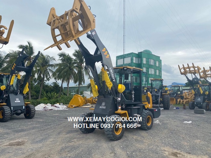 máy xúc lật gầu 0.9 m3
