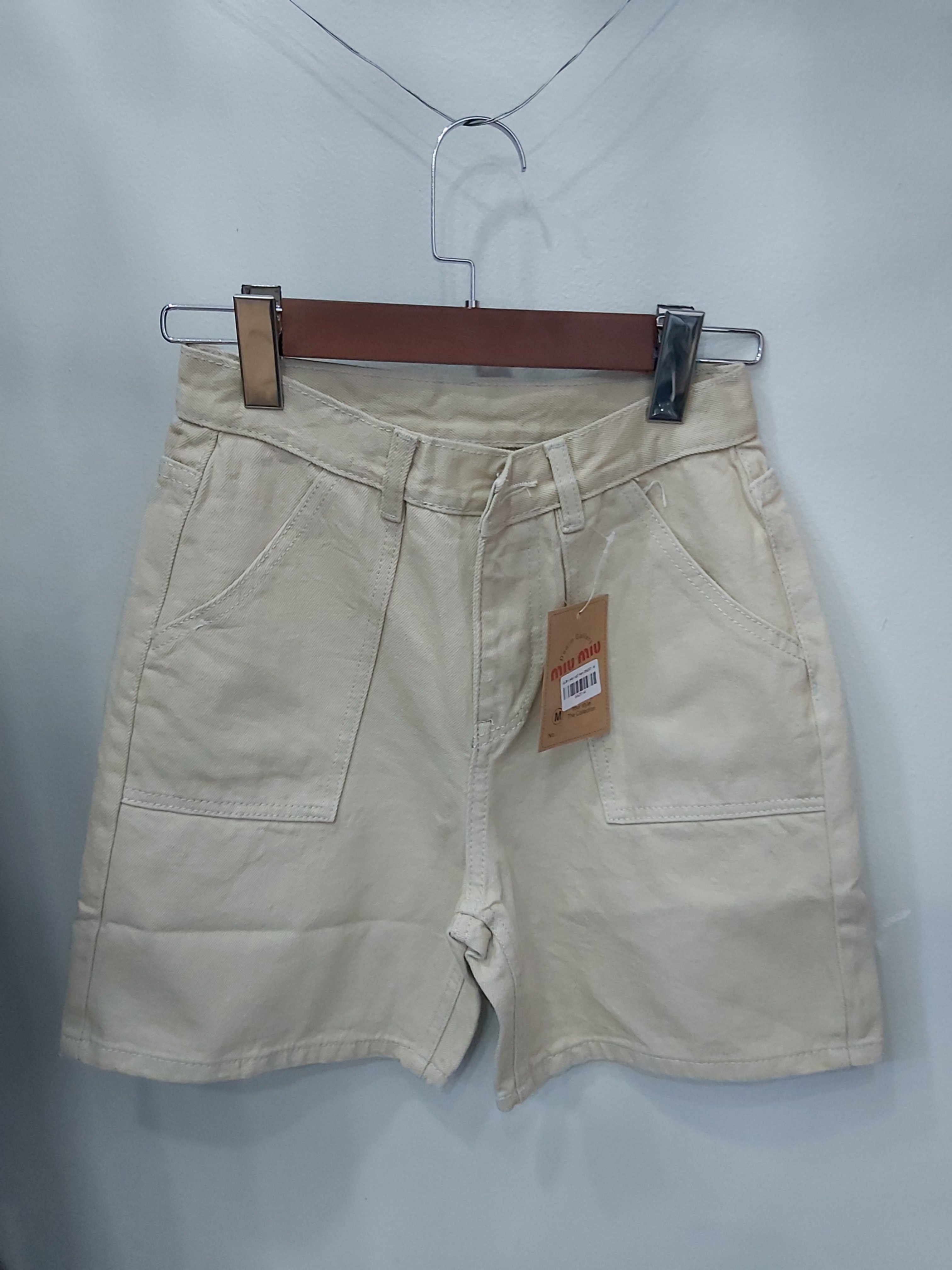 Quần jean ngố túi đắp trơn kem B5257