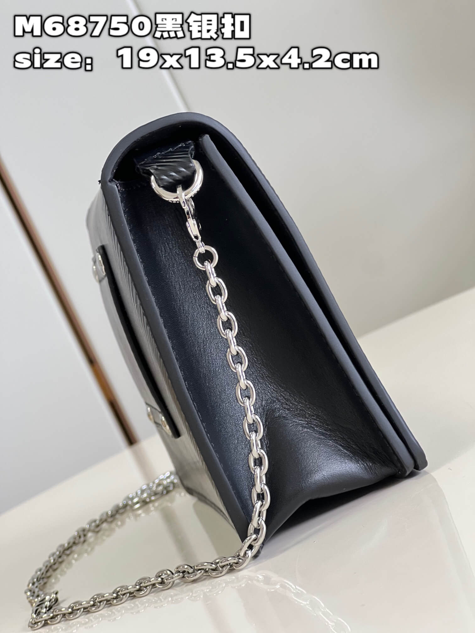 LOUIV Twist Belt Bag
