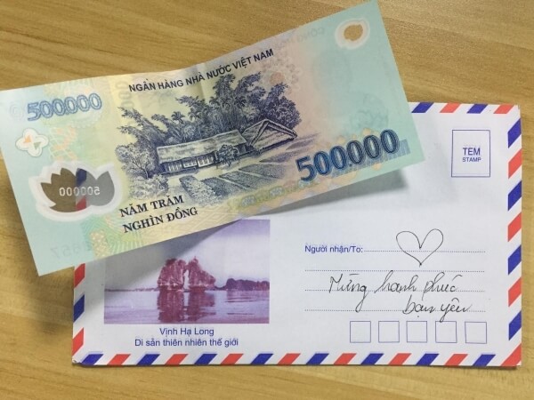  Mơ thấy phong bì có tiền là một điềm báo tốt lành