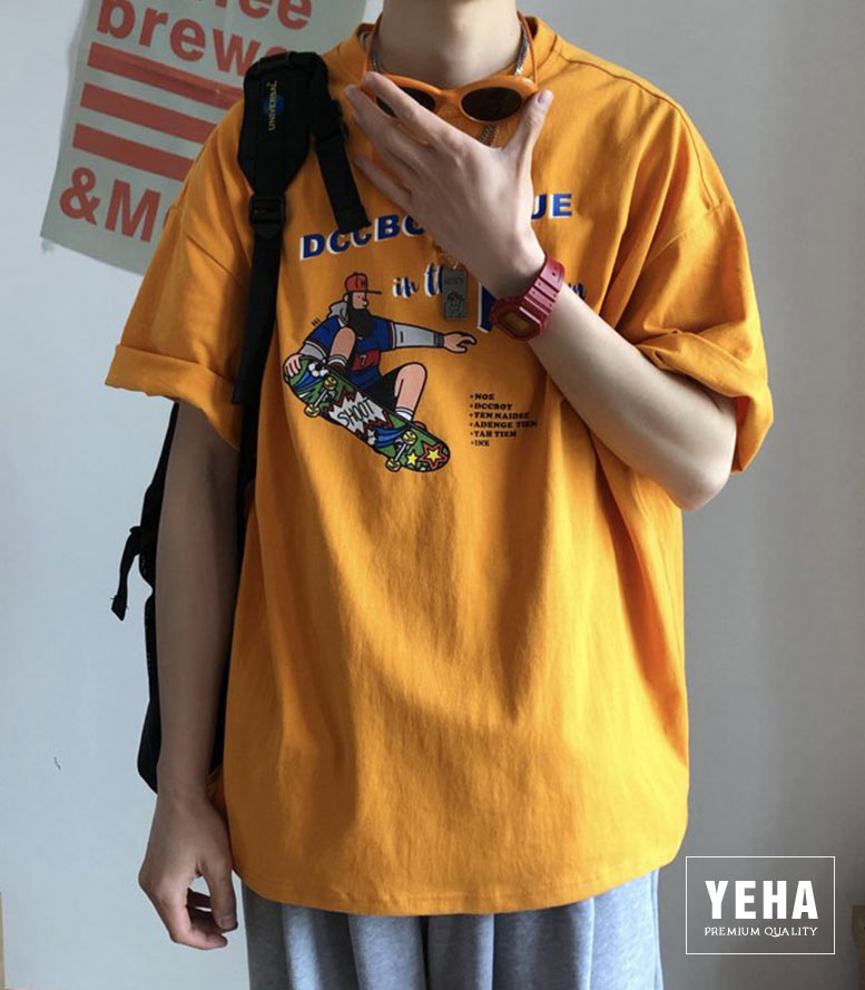 Áo thun unisex form rộng tay lỡ mẫu DCCBOY GAUE màu vàng.