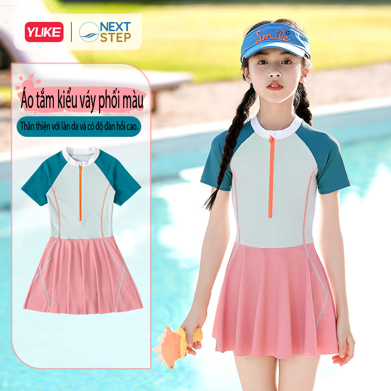 Đồ bơi bé gái, liền than tay ngắn hiệu YUKE phối váy, chất vải co giãn size cho bé từ 13-35kg.