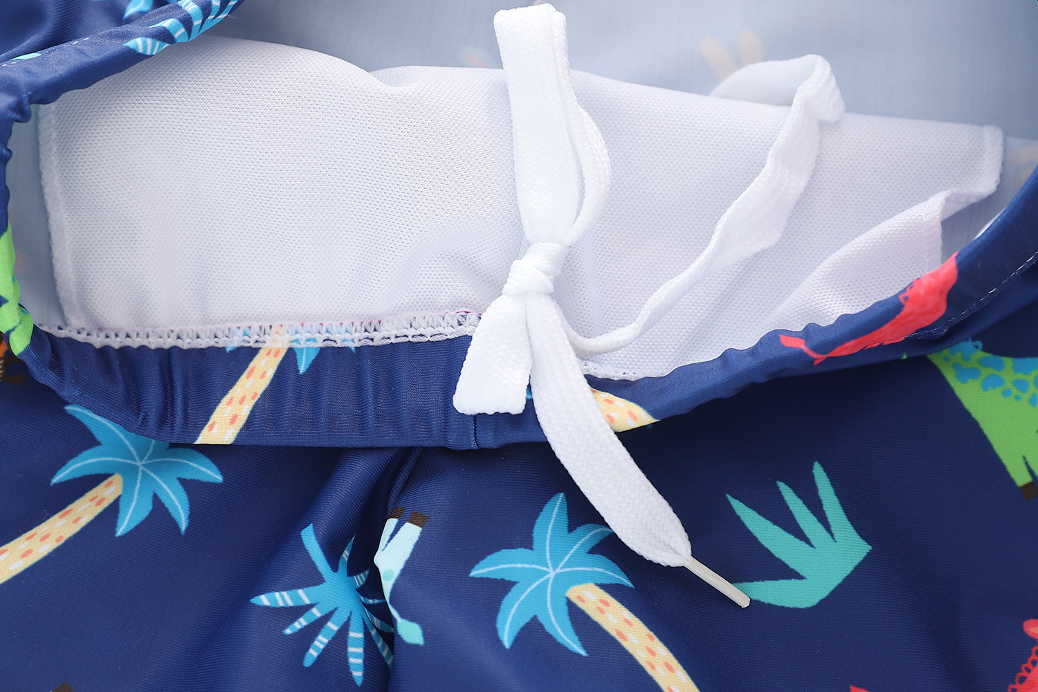 Đồ bơi bé trai tay ngắn quần ngắn họa tiết hươu cao cổ tặng kèm nón bơi đáng yêu size từ 6-24kg