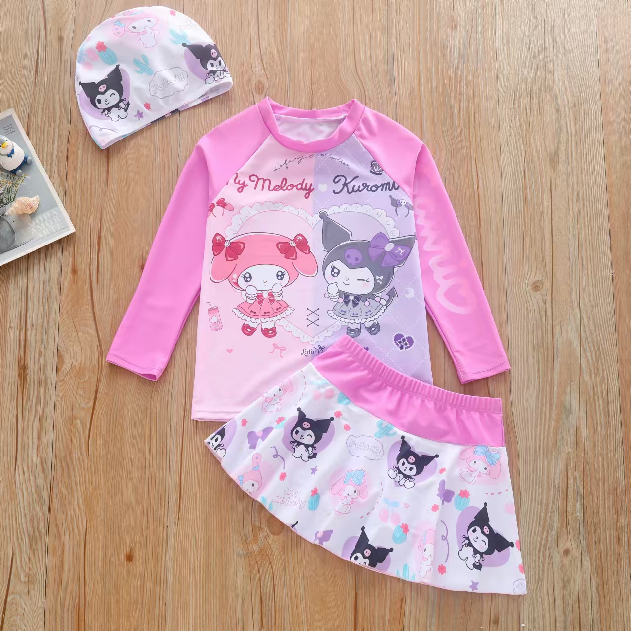 Đồ bơi bé gái tay dài váy rời Kuromi and Melody tặng kèm nón bơi xinh xắn