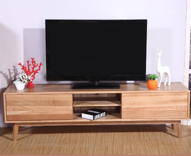 Phòng khách ấm cúng với mẫu kệ tivi gỗ xoan đào sang trọng