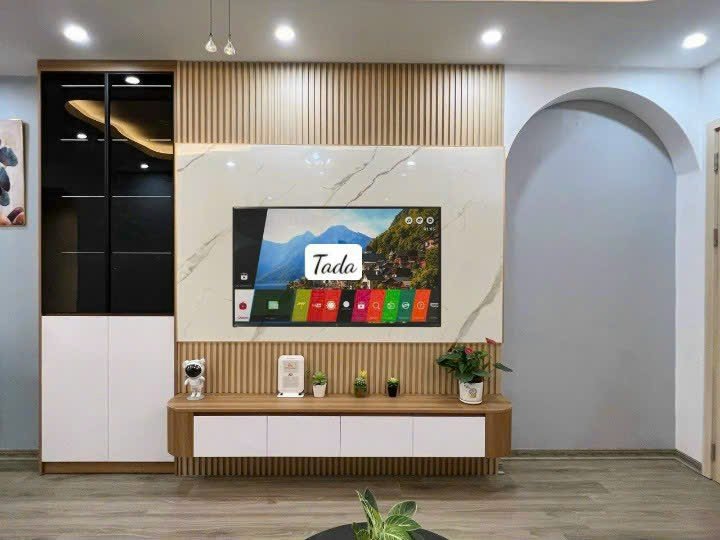 Kệ tivi treo tường bo cong hiện đại cho phòng khách thương hiệu  TADA - TDTV 77