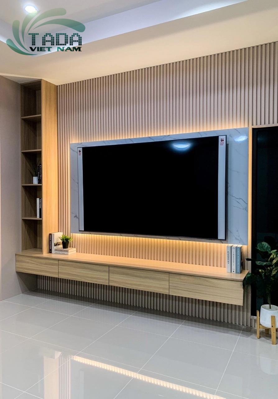 Kệ tivi treo tường đẹp thiết kế riêng thường được đo ni đóng giày cho không gian sống
