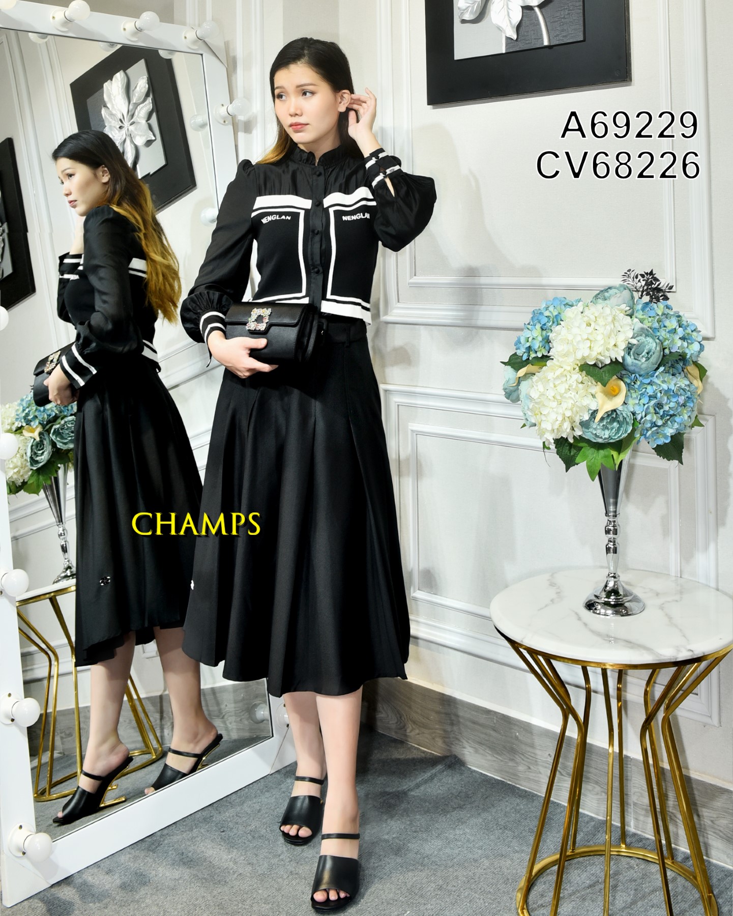 ÁO ĐEN SƠ MI CHANEL LEN 69229