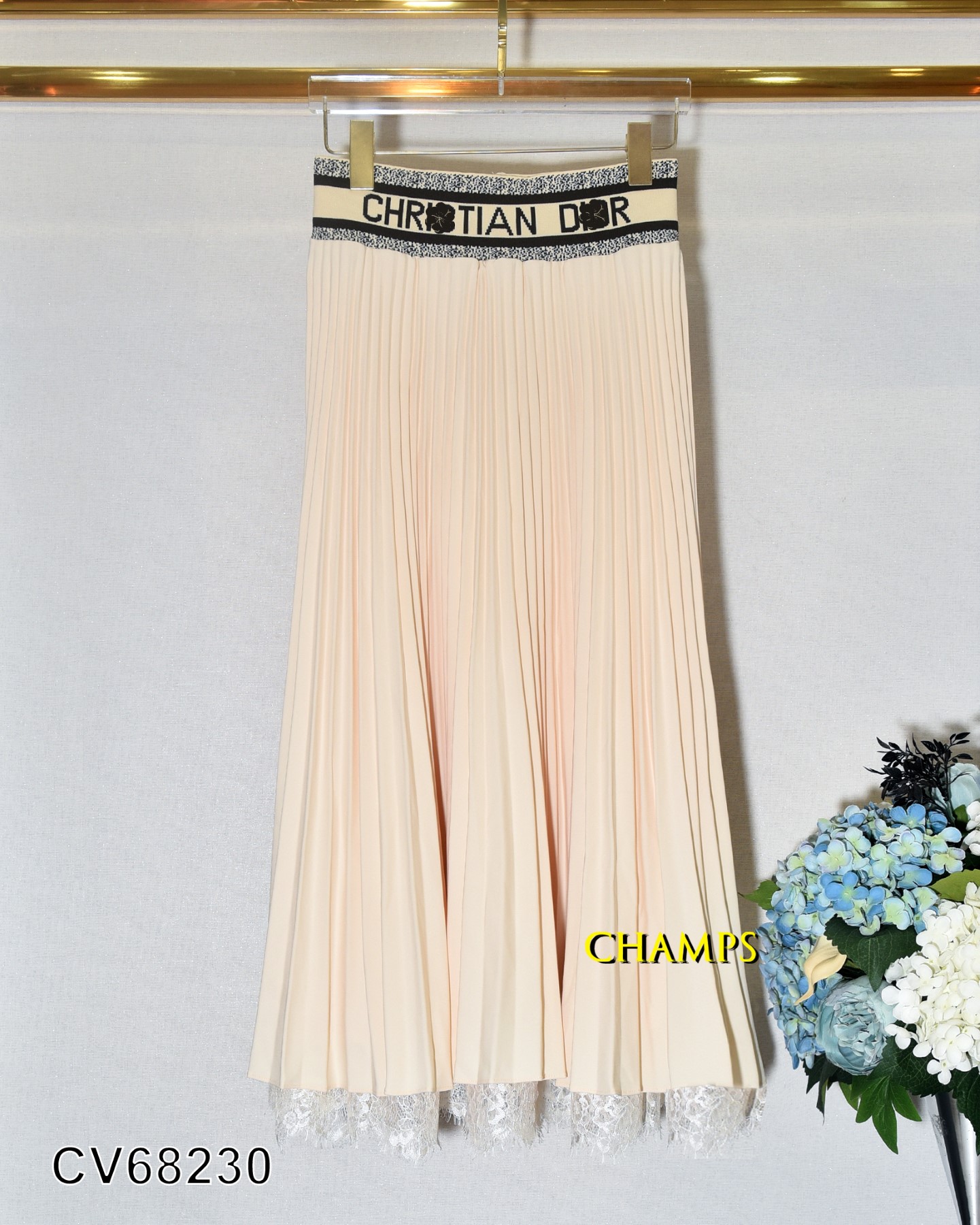 CHÂN VÁY XẾP LY KEM DIOR NHÚNG 68230