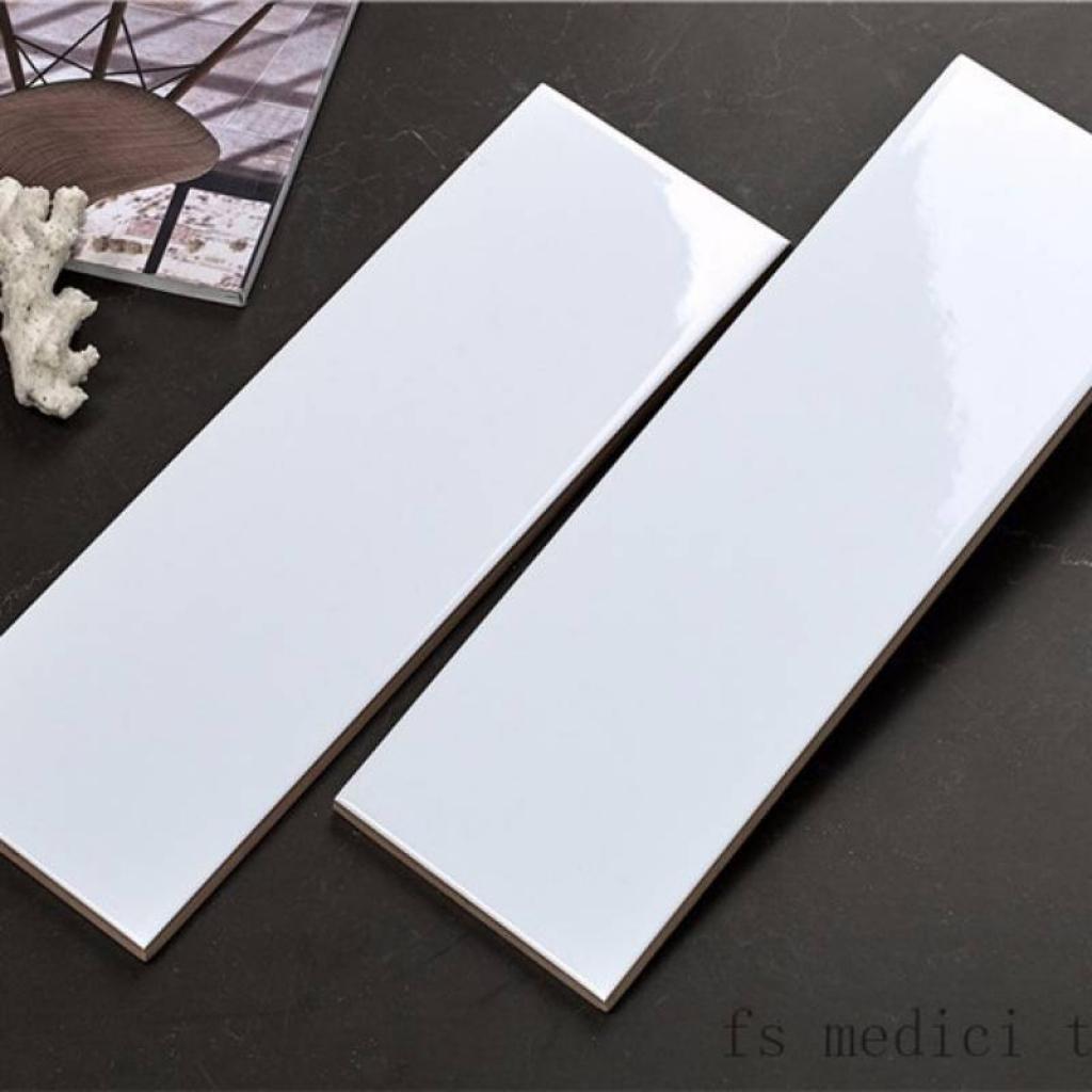 Mẫu gạch thẻ màu trắng ốp tường kích thước 100x300mm