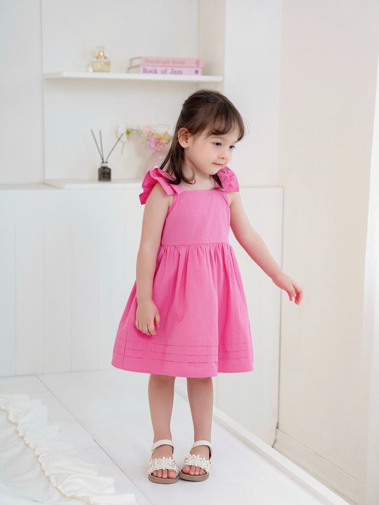 Váy hồng đậm cánh tiên 2T nơ lưng