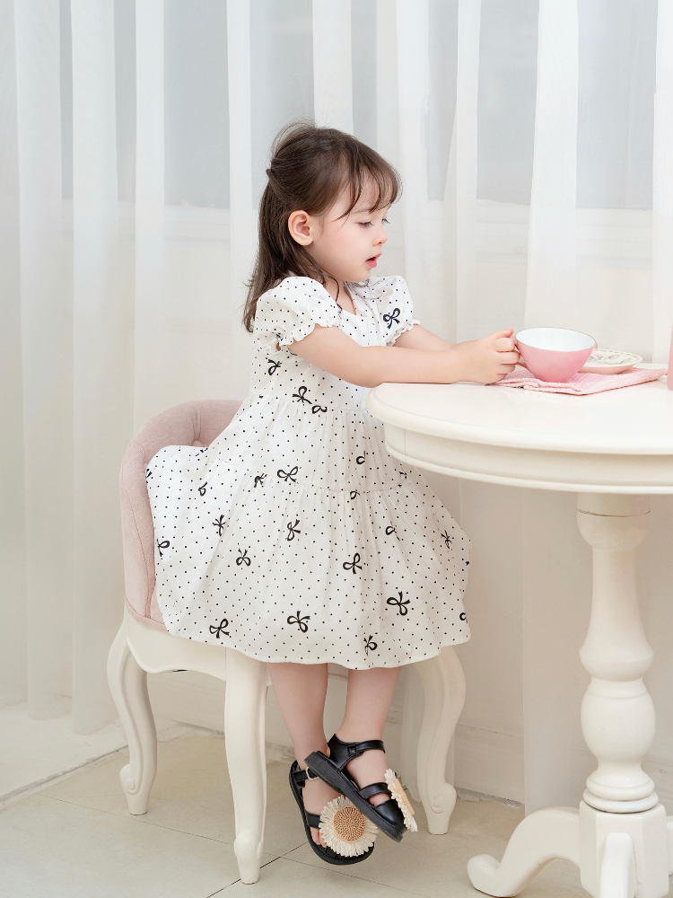 Váy 3T nơ chấm bi đen xinh xắn