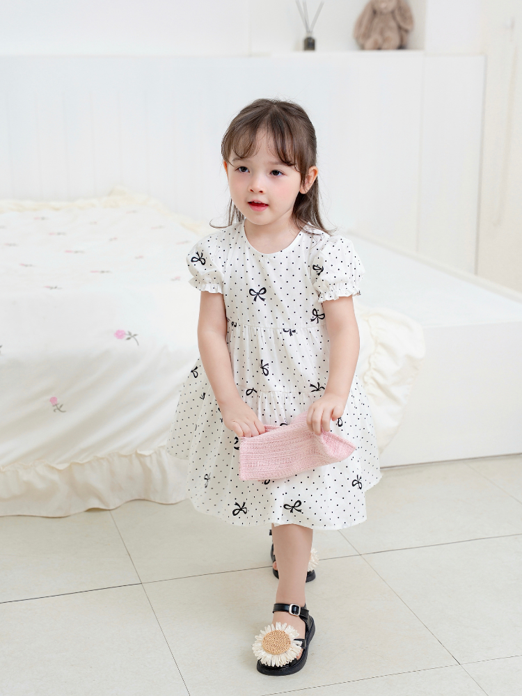 Váy 3T nơ chấm bi đen xinh xắn