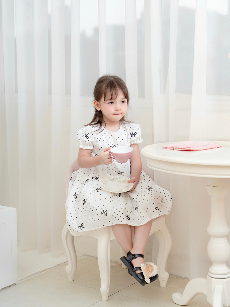 Váy 3T nơ chấm bi đen xinh xắn