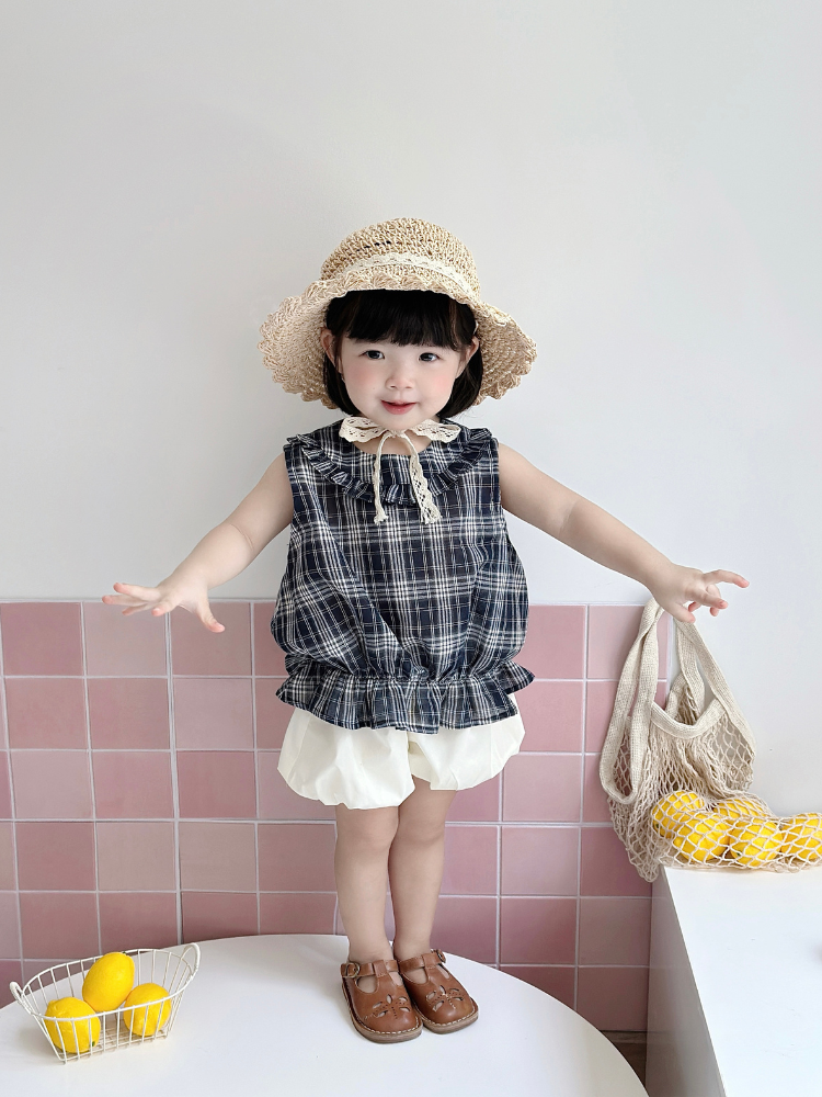 Set áo cổ bèo kẻ navy quần bí siêu xinh