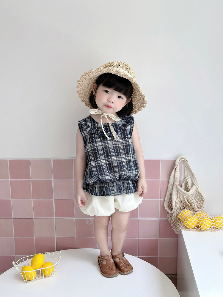 Set áo cổ bèo kẻ navy quần bí siêu xinh