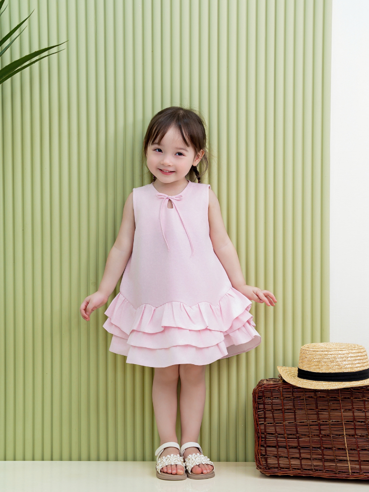 Váy hồng nơ xinh đuôi cá ba tầng