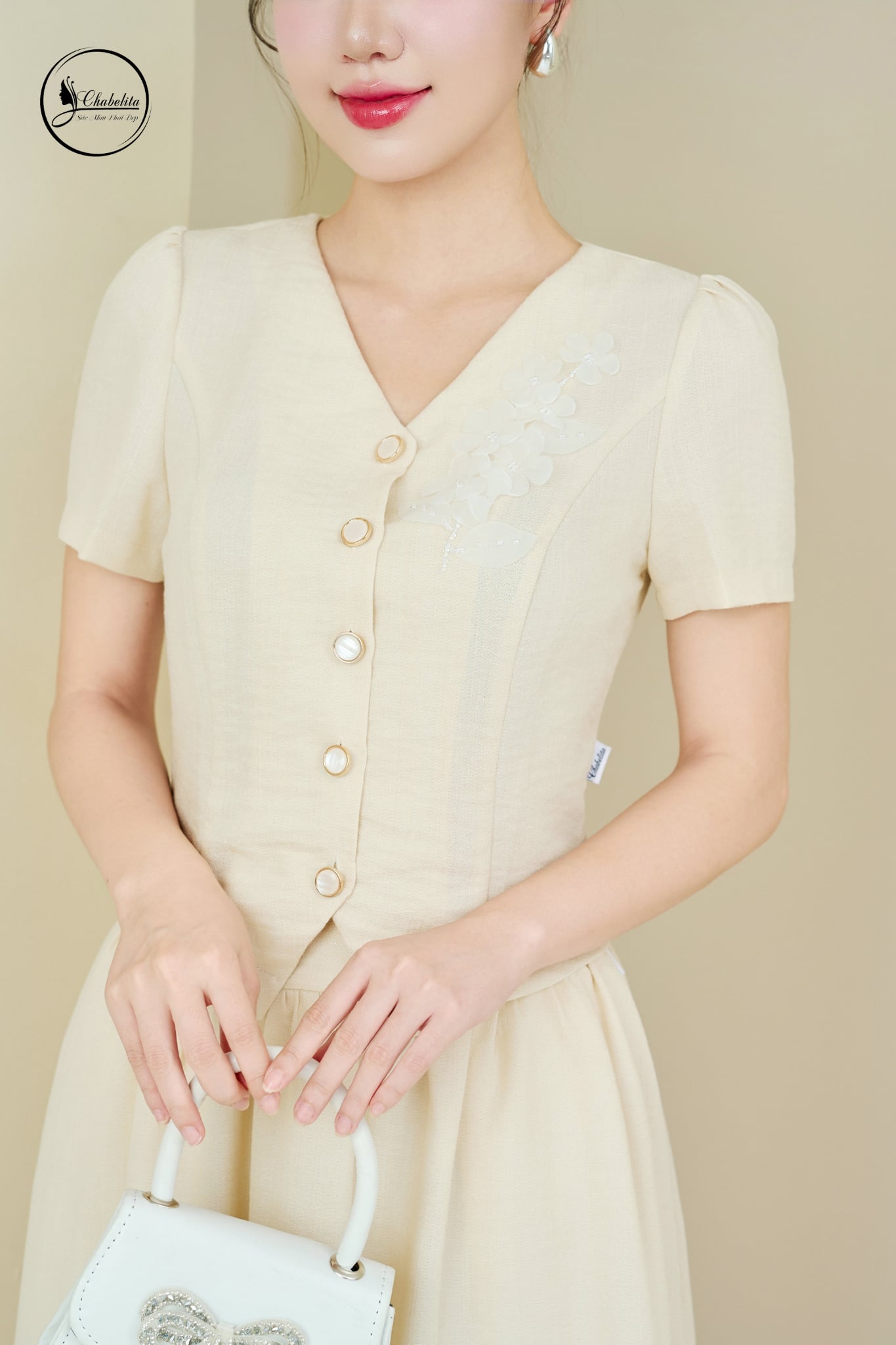 Sét bộ áo tay cộc cổ tim phối chân váy màu be