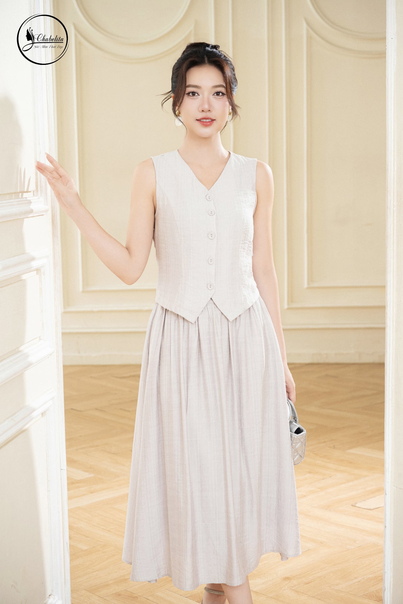 Sét bộ áo sát nách cổ tim phối chân váy màu xám